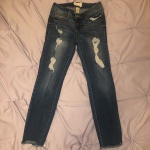 Medium washed distressed skinny jeans